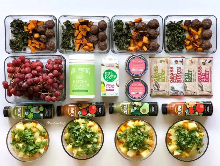Fresh vegetables arranged beside a weekly planner
