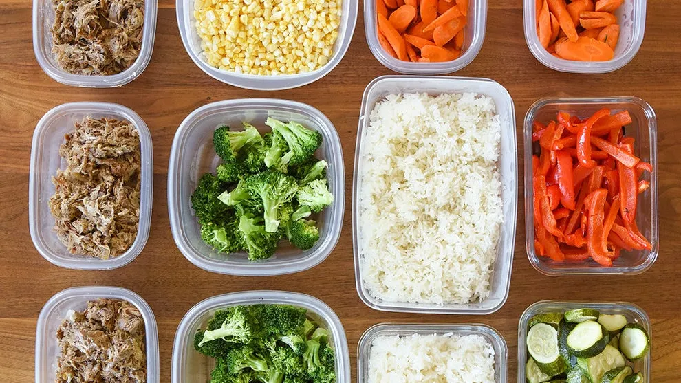 Labeled meal prep containers on a counter